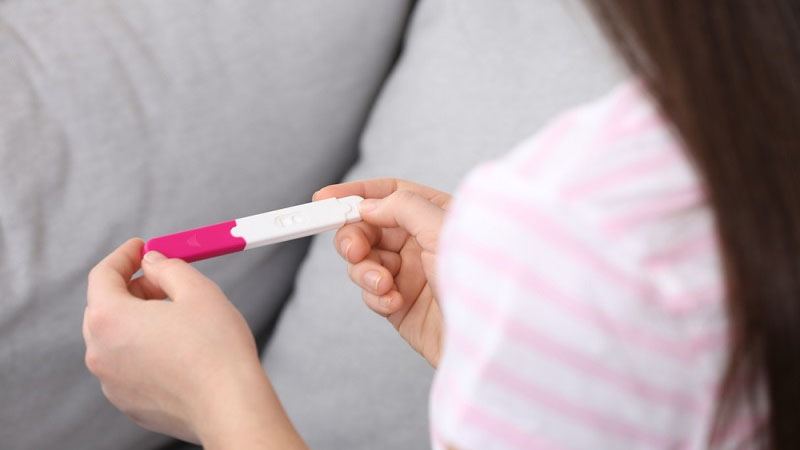 Positive pregnancy test result for women seeking help getting pregnant Hamilton.