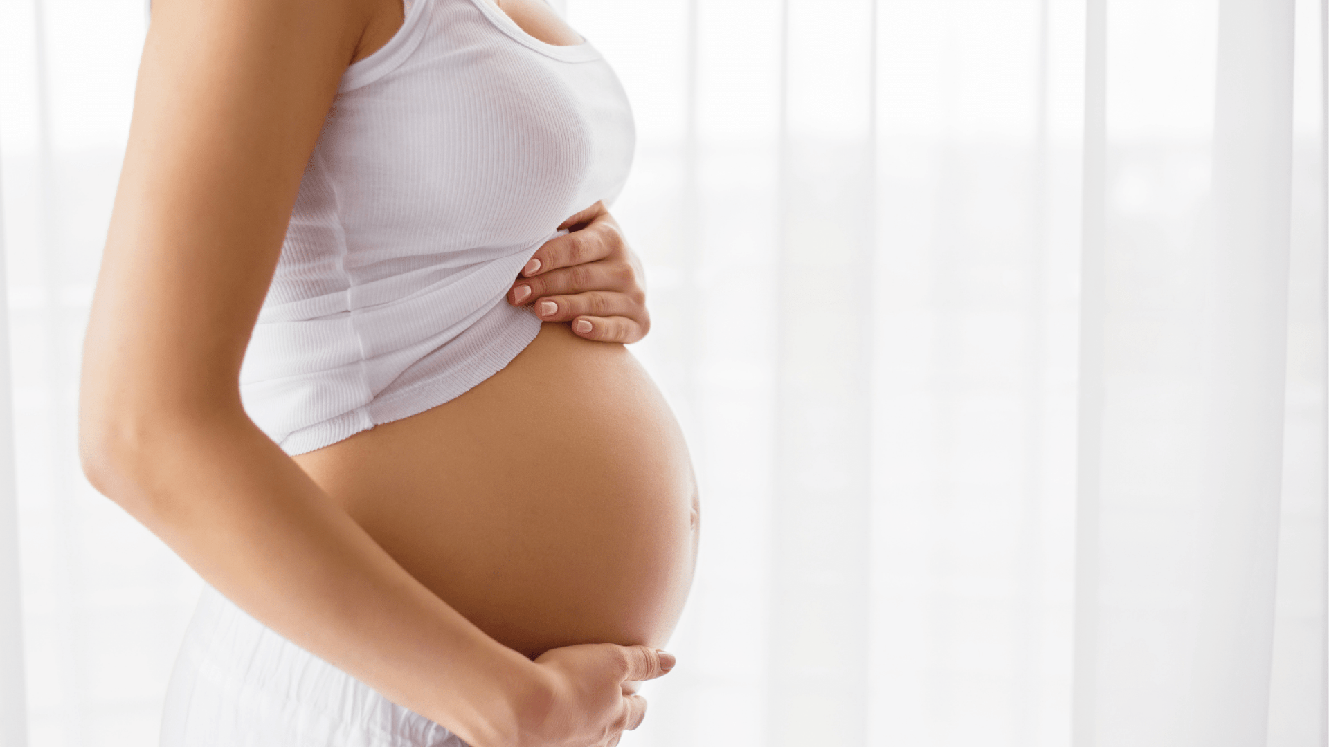 Pregnant woman representing healthy fertility preparation